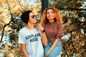 Couple Standing Beside Trees
