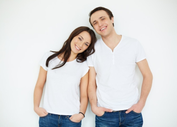 Couple with white shirts and jeans