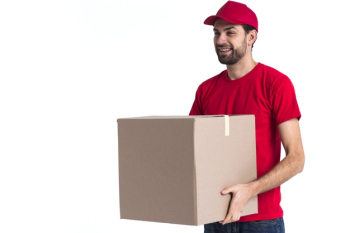 Courier man holding a big delivery box Free Photo