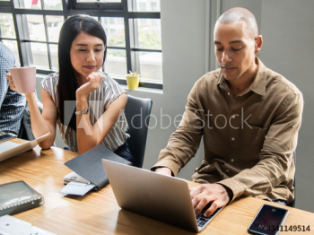 Coworkers in a business meeting Coworkers in a business meeting