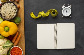 Cutboard with groceries and notebook mock-up Free Photo