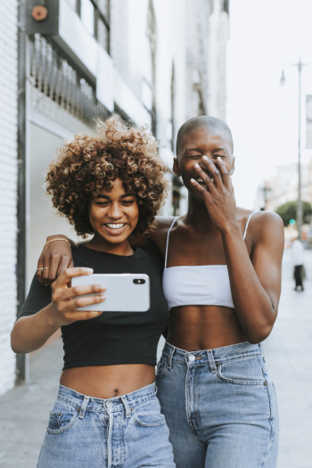 Cute girls making a video call Cute girls making a video call