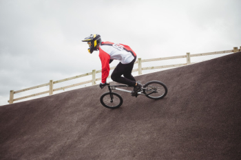 Cyclist riding bmx bike Free Photo