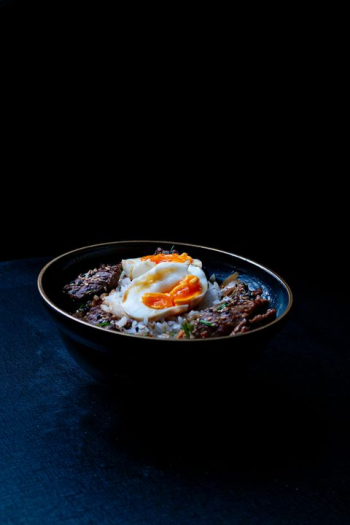 Delicious Bowl of Japanese Udon Noodles with Soft-Boiled Eggs Delicious Bowl of Japanese Udon Noodles with Soft-Boiled Eggs