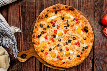 Delicious Mediterranean Pizza with Olive and Citrus Toppings Delicious Mediterranean Pizza with Olive and Citrus Toppings