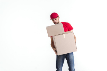 Delivery man leaning over the parcel post boxes Free Photo Delivery man leaning over the parcel post boxes Free Photo
