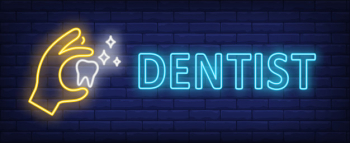 Dentist neon text with hand holding glowing tooth Dentist neon text with hand holding glowing tooth