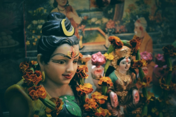Depth of Field Photo of Diety God Statuette