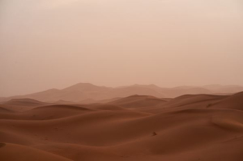 desert under white sky during daytime desert under white sky during daytime