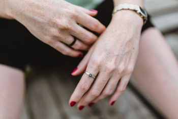Detail of woman's hands and jewelry Detail of woman's hands and jewelry