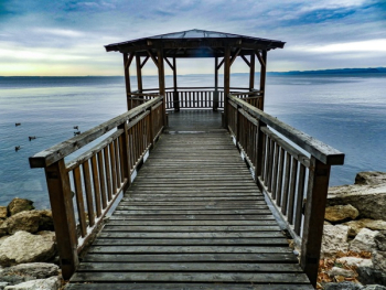 Dock Near Cliff during Blue Hour Dock Near Cliff during Blue Hour