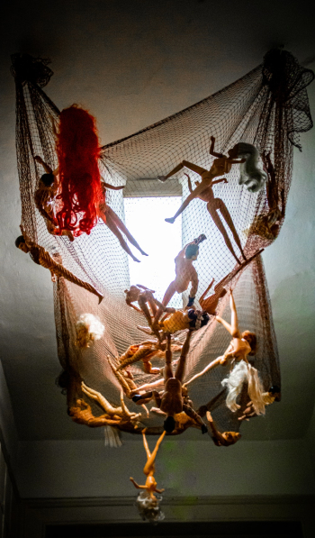 Dolls Hanging On A Net Dolls Hanging On A Net