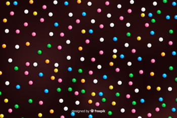 Donut glaze with colourful round sprinkles Free Vector Donut glaze with colourful round sprinkles Free Vector