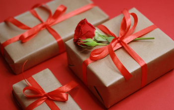 Elegant Gift Boxes with Red Ribbon and Rose Elegant Gift Boxes with Red Ribbon and Rose