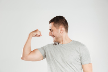 Emotional man showing biceps. looking aside. Free Photo Emotional man showing biceps. looking aside. Free Photo