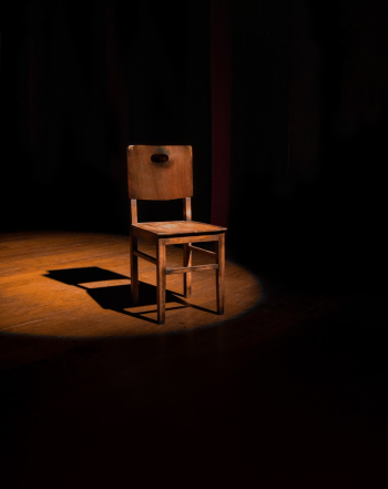 Empty Brown Wooden Armless Chair Empty Brown Wooden Armless Chair