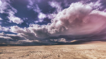 empty desert under gray couldy sky empty desert under gray couldy sky