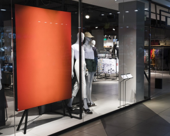 Empty orange sign in clothing store Free Photo Empty orange sign in clothing store Free Photo