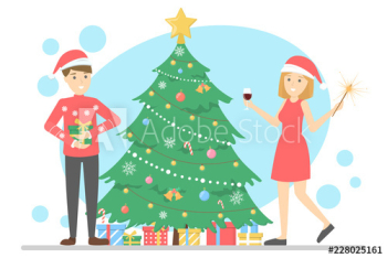 Family have fun together at christmas tree Family have fun together at christmas tree