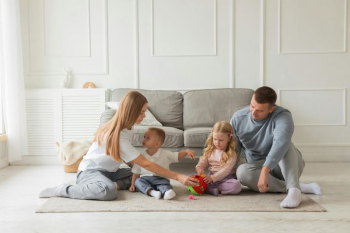 Family Playing Together on the Floor Family Playing Together on the Floor