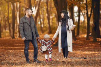 Family with little daughter in a autumn park Free Photo