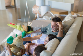 Family with stuffed animals moving into new house Family with stuffed animals moving into new house