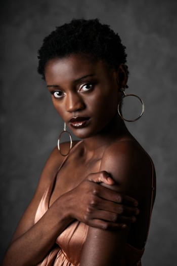 Fashion Model Looks At Camera Fashion Model Looks At Camera