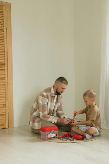 Father and Son Bonding with Toys Father and Son Bonding with Toys