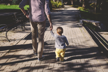 Father and son walking Father and son walking