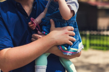 Father Holding Baby Girl Father Holding Baby Girl