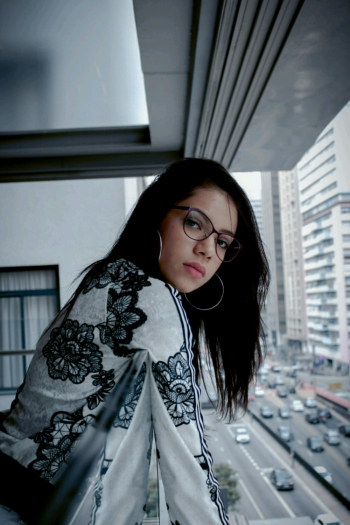 Female Model in a Black and Gray Top