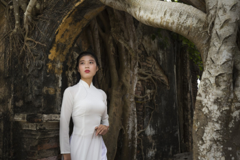 Female Model in a White Dress Underneath and Arc Female Model in a White Dress Underneath and Arc
