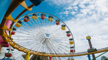 Ferris Wheels Under Blue Sky Ferris Wheels Under Blue Sky