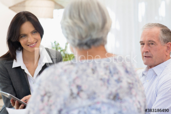 Financial advisor with digital tablet meeting with senior couple Financial advisor with digital tablet meeting with senior couple