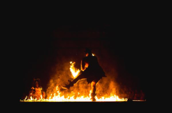 fire dancer near fire pit fire dancer near fire pit