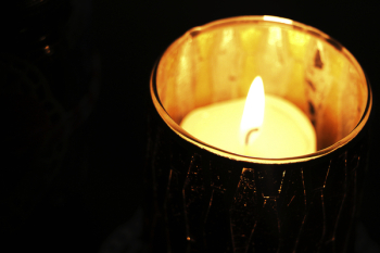 Flame on White Tealight Candle Flame on White Tealight Candle