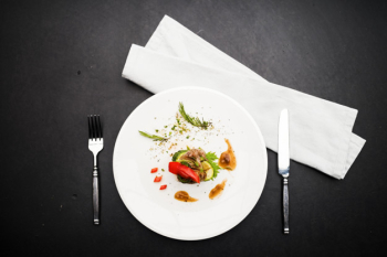 Food styling steak on white plate Food styling steak on white plate