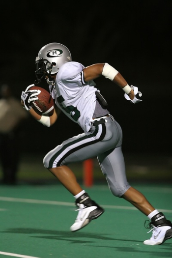 Football Player Holding Football Football Player Holding Football