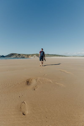 Footprints on a sandy beach, Portugal Footprints on a sandy beach, Portugal
