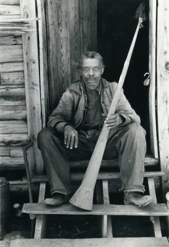 Former slave with horn with which slaves were called; Near Marshall, Texas
