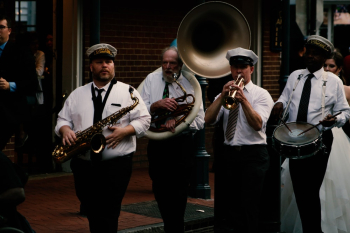 Four Men Playing Musical Instruments Four Men Playing Musical Instruments