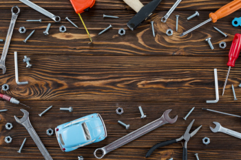Frame made of different tools and toy car Frame made of different tools and toy car