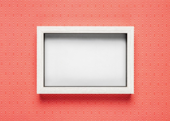 Frame mock-up with orange background Free Photo