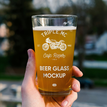 Free Beer Glass in Hand Mockup