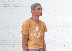 Free Boy Wearing T-Shirt Mockup - Tasty Graphic Designs Collection Free Boy Wearing T-Shirt Mockup - Tasty Graphic Designs Collection