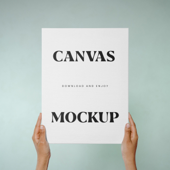 Free Canvas in Hands Mockup