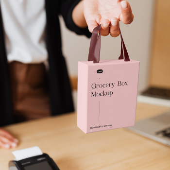 Free Grocery Box in Hand Mockup Free Grocery Box in Hand Mockup