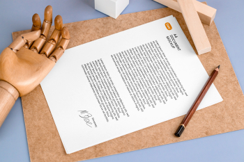 Free Letterhead with Wooden Hand Mockup