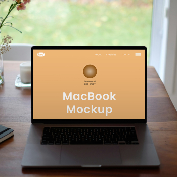 Free MacBook on Table Mockup