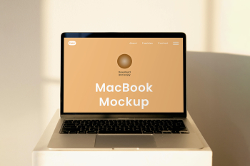 Free MacBook Screen on Coffee Table Mockup